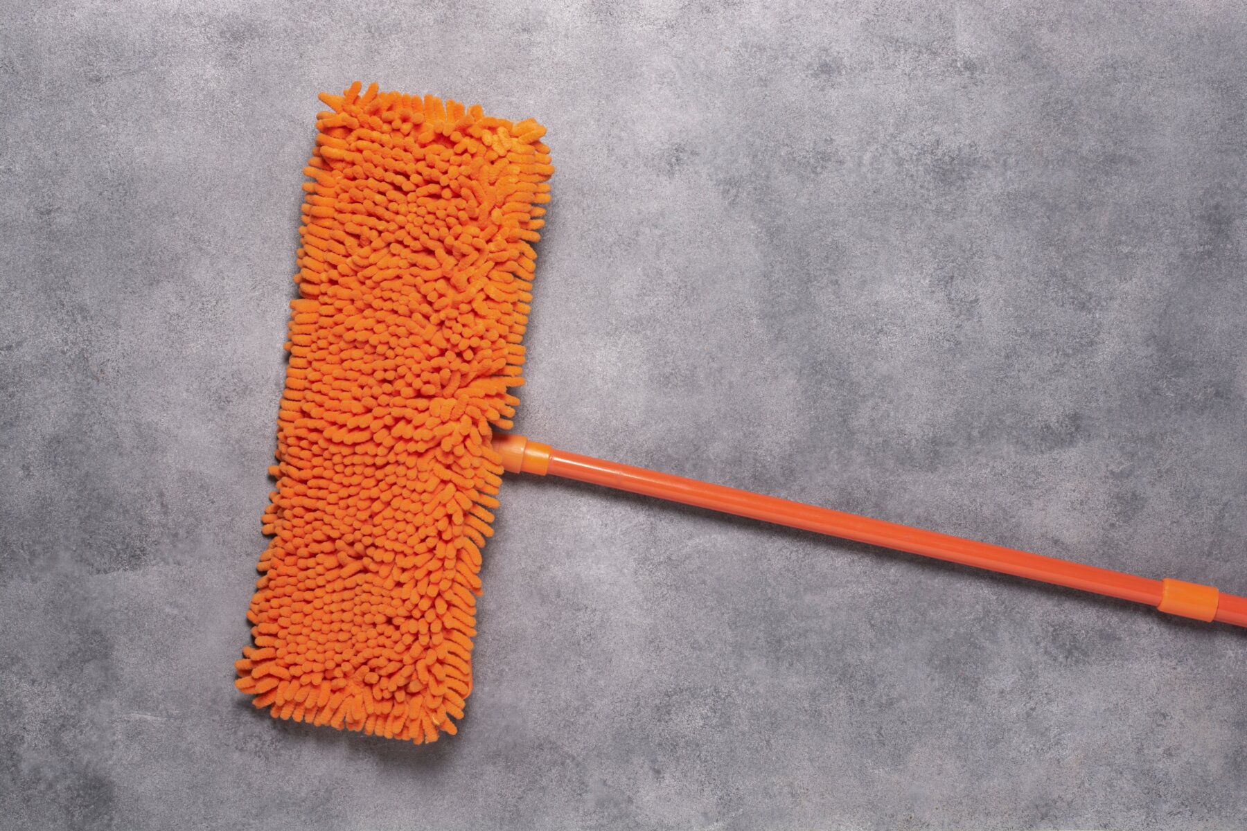 Mop,On,Concrete,Floor.,Top,View.